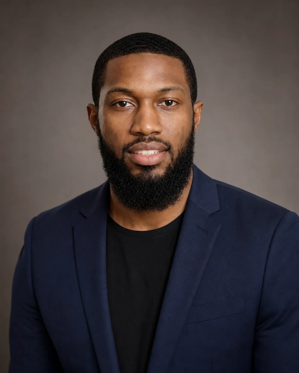 Professional headshot of Dante Bland, marketing systems expert and founder of Dante Bland LLC